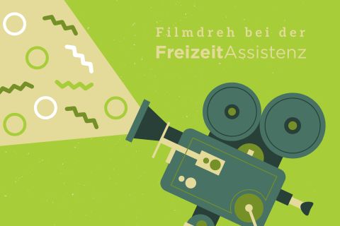 Auf dem Bild steht der Schriftzug „Filmdreh bei der Freizeitassistenz“. Außerdem ist noch eine große Filmkamera mit einem Lichtstrahl abgebildet. 